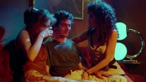 Francesca Neri blindfolded brother-sister incest threesome sex scene riding her brother with breasts exposed from Las Edades de Lulu 1990 Spanish film, explicit taboo erotic moment - img #2