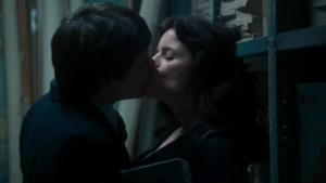 Romina Ricci and Renato Quattordio in passionate intimate scene from Bandit Love Amor Bandido 2021, luxurious mansion bedroom, sensual and tense erotic thriller atmosphere. - img #1