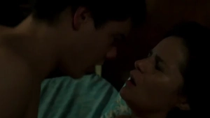 Romina Ricci and Renato Quattordio in passionate intimate scene from Bandit Love Amor Bandido 2021, luxurious mansion bedroom, sensual and tense erotic thriller atmosphere. - img #4