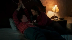 Romina Ricci and Renato Quattordio in passionate intimate scene from Bandit Love Amor Bandido 2021, luxurious mansion bedroom, sensual and tense erotic thriller atmosphere. - img #6