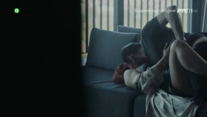 Milica Janevski explicit sex scene from Bones, woman on couch engaging in passionate intercourse with man.