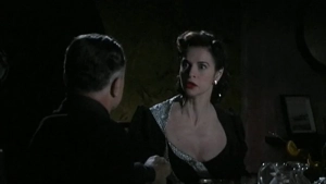 Topless Anna Galiena in full frontal view from Black Angel (2002), breasts exposed in sex scene with older shirtless man from behind. - img #11