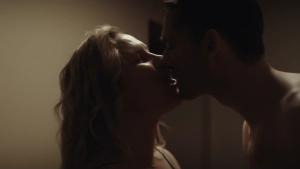 mother kissing son