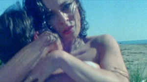 Jasmine Trinca nude beach embrace scene in Gli occhi degli altri 2025