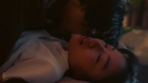 A passionate close-up of Remi Miyamori in an intimate embrace from the movie Like Love (Ai no Gotoku).
