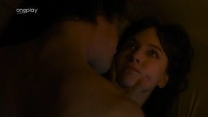 Tereza Voriskova nude intimate scene in Monyová, close-up of passionate embrace and dramatic lighting.