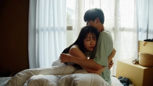Yuki Araho and man intimate embrace in bed near white curtains Young & Fine