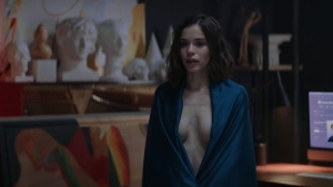 Kristina Kucherenko partial nudity in a sensual scene from Zhit zhizn S02 (2024), dramatic studio setting.