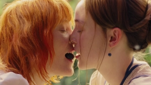 Ella Beatty and Vicky Krieps, kissing scene from Monster: The Lizzie Borden Story (2026)
