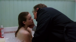 Alicia Silverstone topless with J.T. Walsh in a bathtub, scene from The Babysitter (1995)