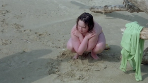 Anaïs Reboux nude on a beach, scene from Fat Girl (2001)
