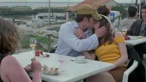 Anaïs Reboux and Roxane Mesquida kissing Libero De Rienzo, scene from Fat Girl (2001)