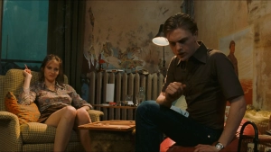 Eva Green and Michael Pitt in a living room, scene from The Dreamers (2003)