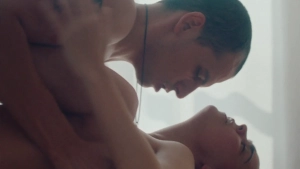 Katia Borlado nude in Notes on a Summer (2023) — in a sex scene, lying on her back with Álvaro Quintana in a bedroom