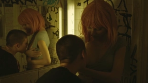 Medea Strid hot scene in Without Kelly (2025) — in a suggestive pose, undressing Ida Broddlinder in a bathroom
