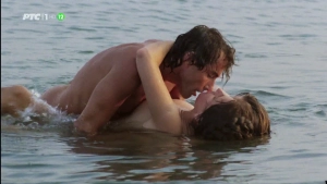 Alain Noury during foreplay on a beach, scene from The Beauty of Vice (1986)